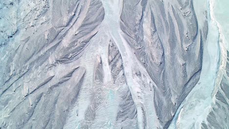 4k-60fps-aerial-video,-facing-straight-down,-of-the-Matanuska-River-Valley,-in-Sutton,-Alaska