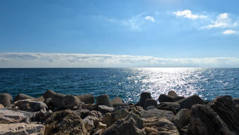 4k-Shot-of-beautiful-horizon-over-water-by-the-famous-Puerto-Banus-Bay-in-Marbella,-Spain