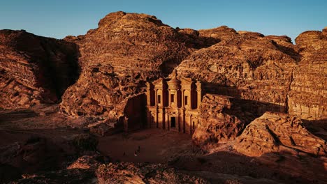 Time-lapse-video-of-Ad-Deir-Monastery-in-Petra,-Jordan,-the-famous-historic-UNESCO-heritage-site-with-The-Treasury-carved-into-sandstone-and-limestone-by-the-Nabateans