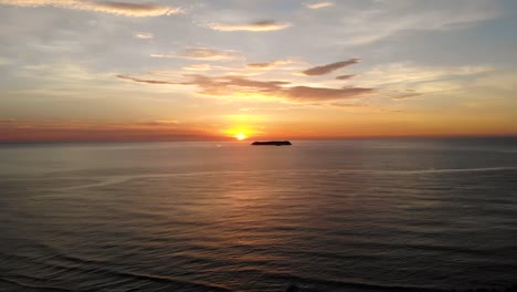 Aerial-Drone-Shot-of-Sunset-Island-and-Sea-in-Florianopolis,-Brazil