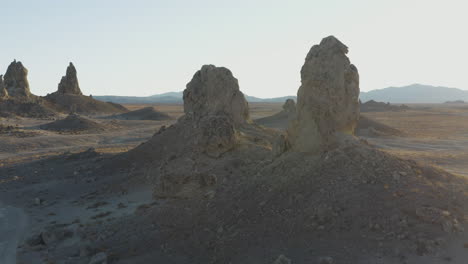 -establishing-aerial-shot-of-wide-pinnacles-on-a-sunny-day-in-the-california-desert
