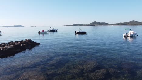 Boats-floating-along-the-Coast-of-Biograd-na-Moru,-Dalmatia,-Croatia---Aerial-Drone-View