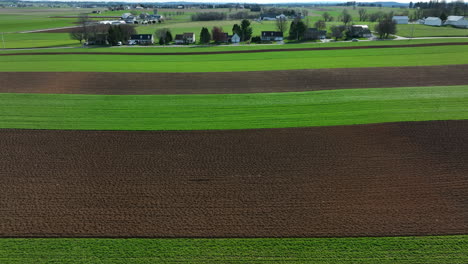 Rural-farmland-fields-in-spring-planting-season-in-Lancaster-County-Pennsylvania-USA