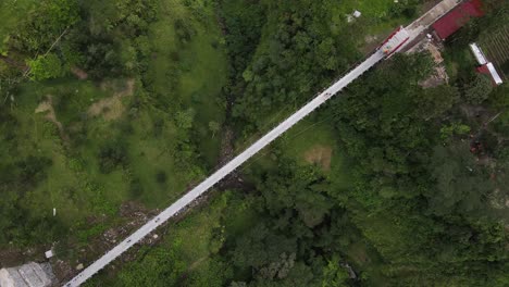 A-tourist-destination-for-the-Girpasang-suspension-bridge-which-has-a-means-of-crossing,-namely-the-gondola-on-the-slopes-of-Mount-Merapi