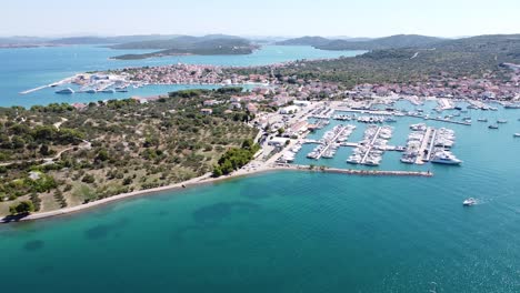 Murter-Kornati-and-Betina-Village-at-Murter-Island,-Dalmatia,-Croatia---Aerial-Drone-View-of-the-Harbor-with-Boats-and-Yachts