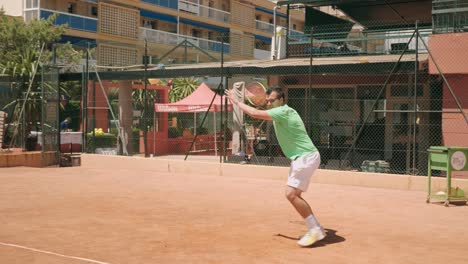 Tennis-ball-rebound-and-player-hit-with-racket,-slow-motion