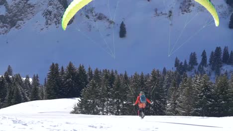 Paraglider-Taking-Off-In-The-Mountains