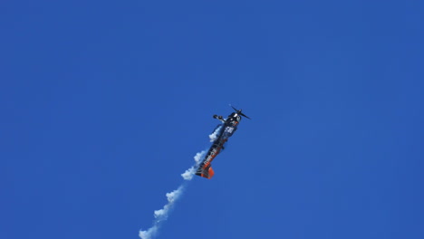 Thiene,-Vicenza,-Italy--October-16th-2021:-an-acrobatic-airplane-flies-up-and-down-in-G+,-G--and-9G-maneuvering-style