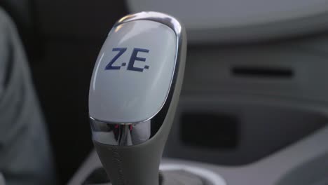 Driver's-Hand-Shifting-Gearstick-Knob-Of-A-Renault-Zoe-Car