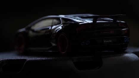 A-white-light-over-a-black-Lamborghini