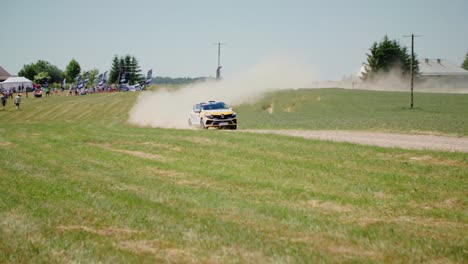 Sport-car-coming-from-afar-in-a-dust-cloud-slow-motion