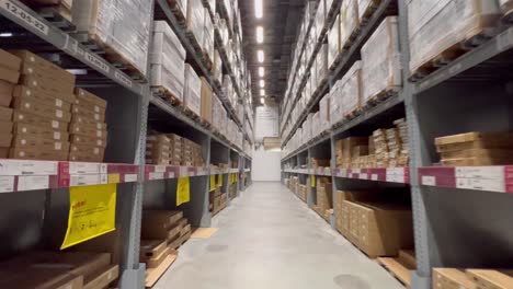 Take-a-stroll-through-the-warehouse,-where-a-lot-of-paper-boxes-are-kept-for-the-retailers