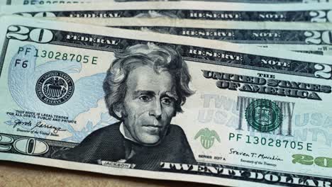 Focus-in-a-bunch-of-20-dollar-bills-USDs-Andrew-Jackson-4k