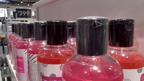 A-close-up-shot-of-different-cosmetics-on-shelves-in-a-mall