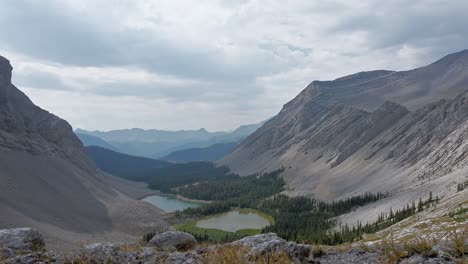 Mountain-ponds-valley-cloud-shade-static-Rockies-Kananaskis-Alberta-Canada