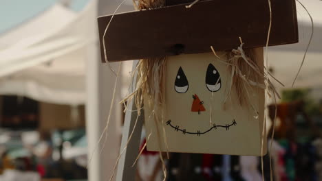 Wooden-scarecrow-craft-decorations,-Slow-Motion
