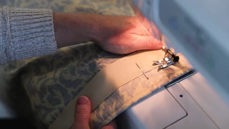 Close-Up-Of-Woman-Sewing-Fabric-In-Slow-Motion