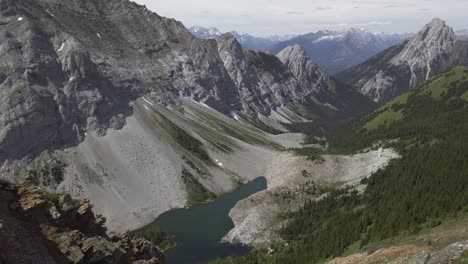 Mountain-valley-with-lake-in-backcountry-Rockies-Kananaskis-Alberta-Canada