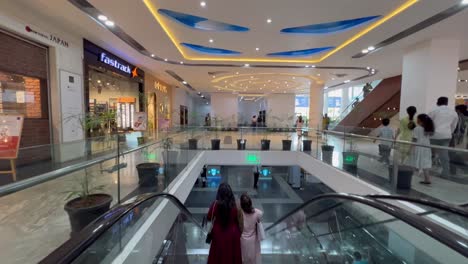 A-running-shot-of-modern-luxury-escalators-with-staircase-escalator-in-community-Mall