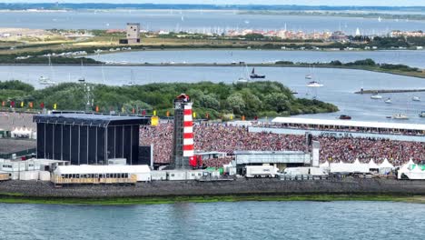 Large-crowds-of-people-at-venue-concert-at-sea-in-Netherlands