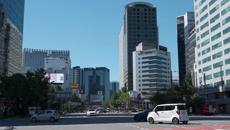Traffic-At-Taepyeongno-Thoroughfare-In-The-Central-Districts-Of-Seoul,-South-Korea-From-Seoul-Plaza