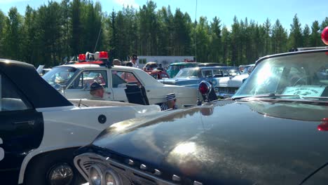 Vintage-Police-Car-at-Classic-Car-Meet-in-Dalarna,-Event-with-many-Old-American-Cars