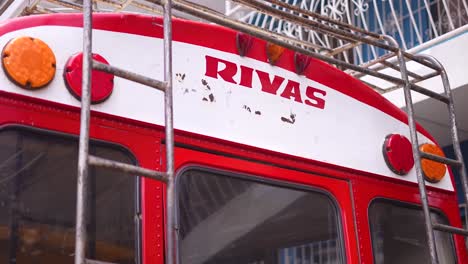Bus-De-Rivas,-Bus-Viejo,-Camioneta-Vintage,-Letrero-De-La-Calle-Calles-San-Juan-Sur,-Nicaragua,-Pueblo-Nicaragüense,-Costero,-Pobreza,-Managua