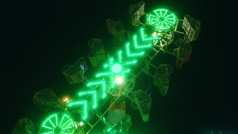 Night-time-view-of-The-Zipper-thrill-ride-at-The-Exhibition