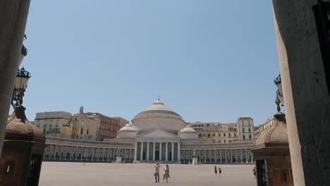 People-at-the-majestic-Piazza-del-Plebiscito-and-Basilica-Reale-Pontificia-San-Francesco-da-Paola,-Naples,-Italy