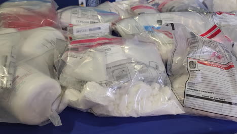 Bags-of-Meth-Fentanyl-White-Powder-Illegal-Drug-Seized-by-Canadian-Regional-Police-90-Kilo-Project-Warrior