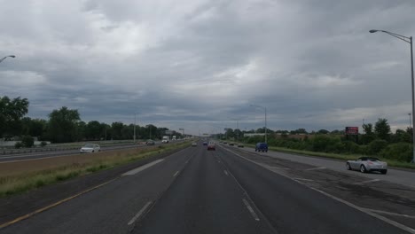 POV:-Driving-on-the-middle-lane-of-the-American-highway-in-Chicago,-Illinois