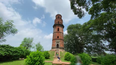 Timelapse-video-of-an-ancient-tall-stone-pillar-in-the-ruins-of-the-village-of-Gaur