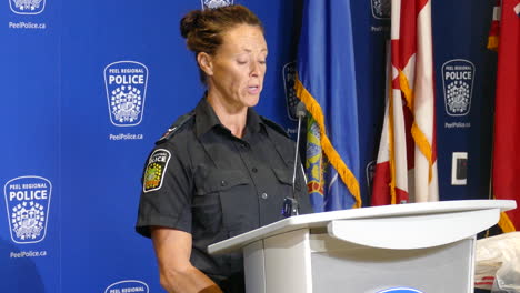 Female-Police-Officer-Speaking-At-The-Project-Warrior-Drug-Bust-Operation-Press-Conference