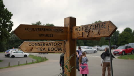 Conservatory-tea-room-and-visitor-centre-sign-in-a-carpark-at-Bradgate-park-in-Leicestershire-England
