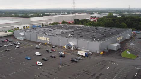 Aerial-orbit-right-view-makro-cash-and-carry-wholesale-supermarket-store-exterior