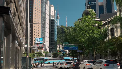 City-life-in-Seoul-downtown-Jung-gu-district-with-view-of-symbol-N-Seoul-Tower-on-summer-day
