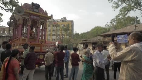 Devotees-clicking-pictures-of-Lord-Hanuman-during-Ram-Rath-procession-which-started-from-Kalaram-Mandir-to-celebrate-holy-festival-of-Ram-Navmi-in-the-evening