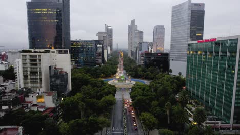 Aerial-view-overlooking-quiet-streets-of-downtown-Mexico-city-on-a-cloudy-morning---static,-drone-shot