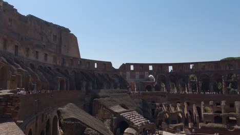 View-inside-the-gladiatorial-arena-and-hypogeum,-interior-of-the-Colosseum,-ancient-amphitheatre-in-Rome