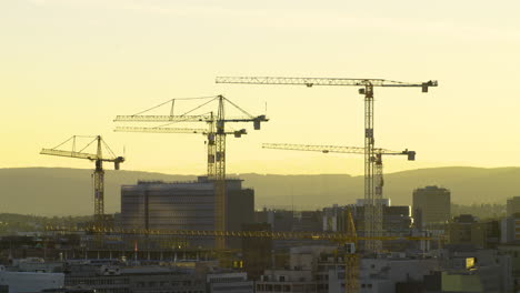 City-cranes-moving-and-building-houses-and-building-in-Oslo