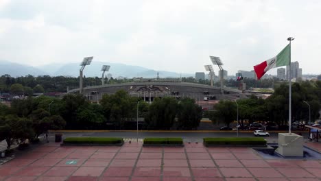 Aerial-Shot-Approaching-the-Empty-University-Olympic-Stadium-from-the-Central-University-Campus-of-the-UNAM-on-a-Cloudy-Day-in-Mexico-City