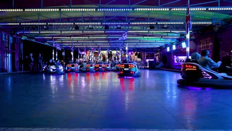 Extravagantly-lit-dodgem-cars-circle-the-floor-on-a-ride-at-Stokesley-Fair---September-2022