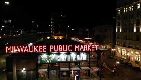Slow-Ascending-Aerial-Shot-Of-The-Milwaukee-Public-Market-At-Nightime
