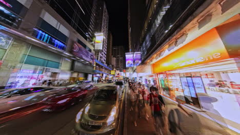 Night-hyperlapse-POV-shot---walking-in-Mong-Kok-Sai-Yeung-Choi-Street,-Hong-Kong