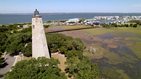 aerial-pullout-from-old-baldy,-bald-head-island-nc-lighthouse