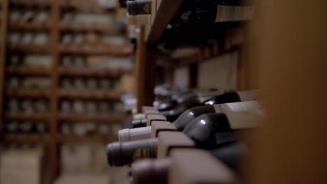 Interior-wine-cellar-with-shelves-of-vintage-collection-Rack-Focus-Shot