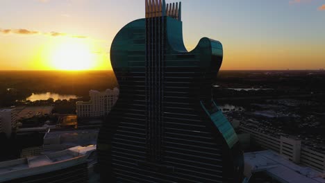 Details-on-the-guitar-shaped-Seminole-Hard-Rock-Hotel,-sunny-evening-in-Hollywood,-Florida,-USA---Aerial-view