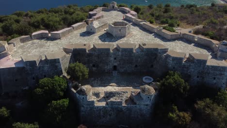 Drone-shot-of-a-former-Ottoman-castle---drone-is-flying-away-from-the-entrance-of-the-castle