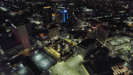 Establishing-Shot-Of-Downtown-El-Paso-Texas-Buildings-At-Night-With-Urban-City-Lights-Seen-From-Aerial-Drone-Perspective