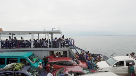 Passengers-and-Vehicles-Travel-on-Cargo-Vessel-on-River-Afram-in-Ghana